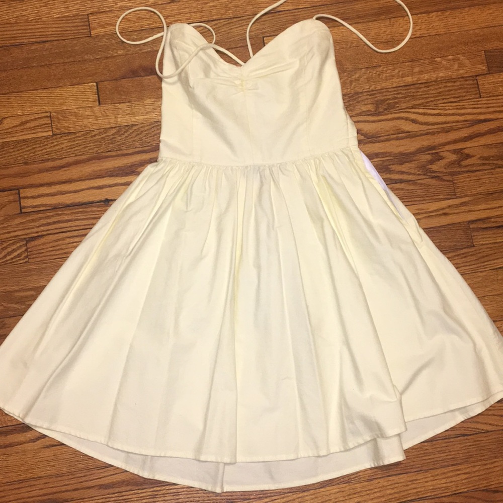 Pale yellow American Apparel lace up sundress